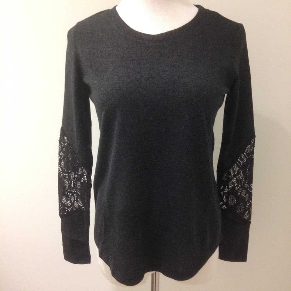 Pretty Top with Lace Cutout Sleeves.